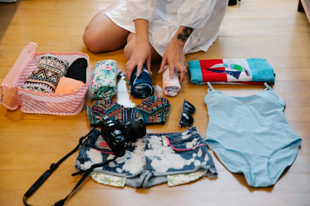 Erasmus student packing clothes for semester abroad